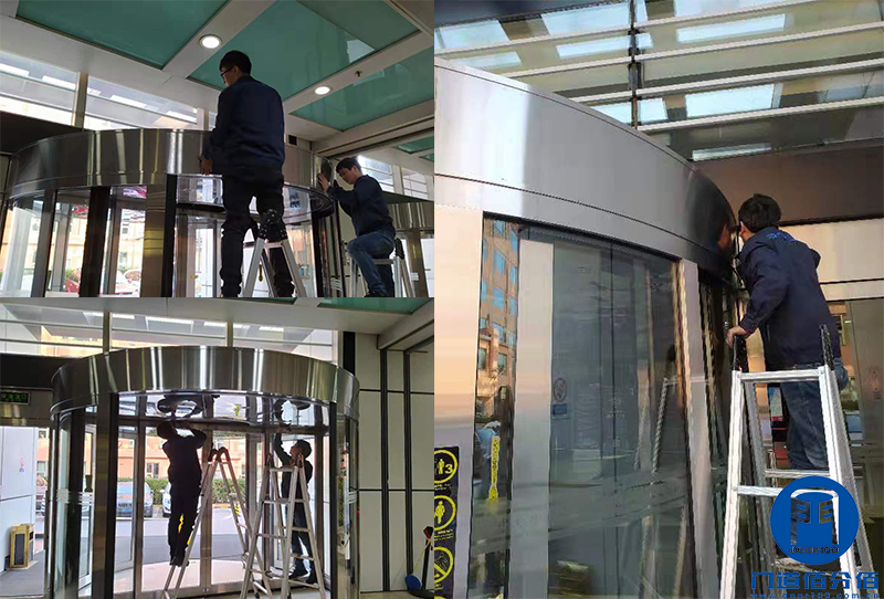 北京某大廈東南門自動旋轉門軌道翻新服務